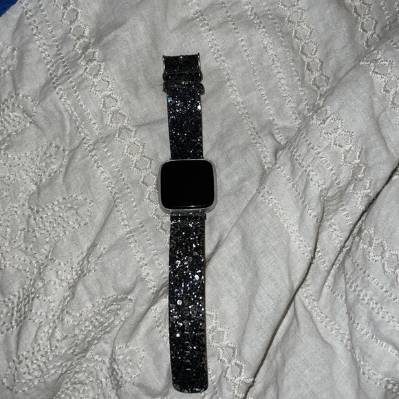 Fitbit versa lite, slight wear and tear but works great!